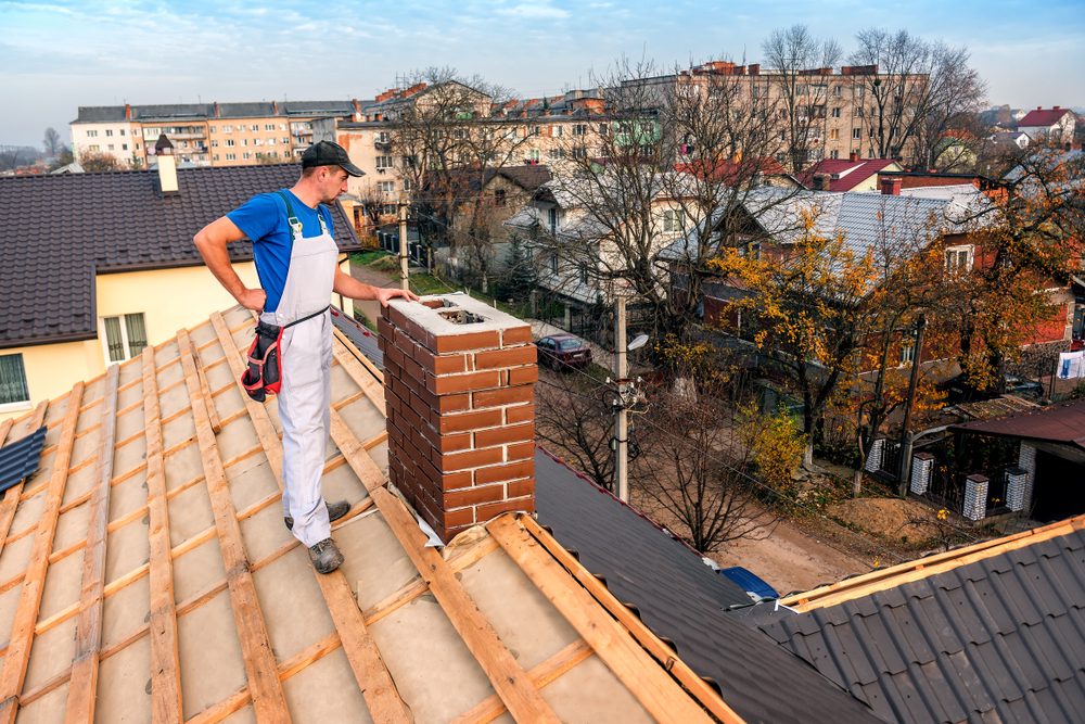 image shows roof installer